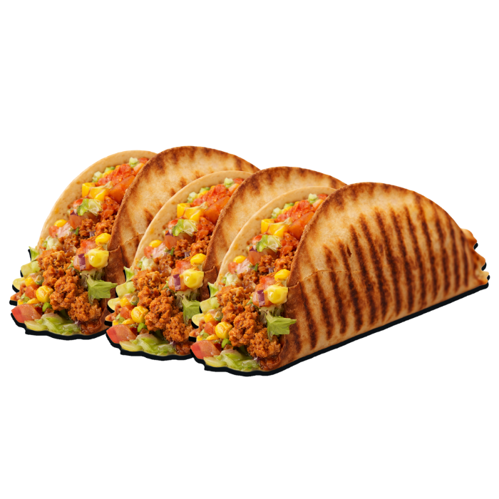 Drie knapperige taco's met gemarineerd vlees en verse toppings