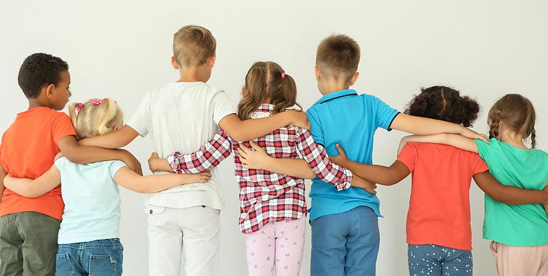 A Children's Center volunteer helping a family