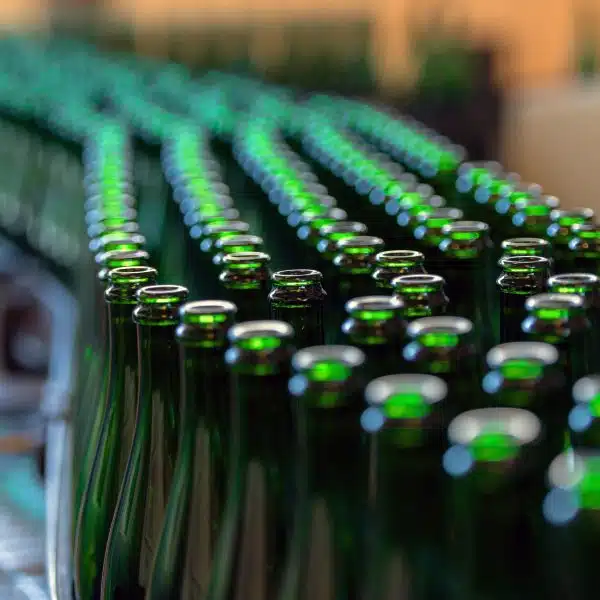 Bottles on a conveyor belt in a food and beverage factory